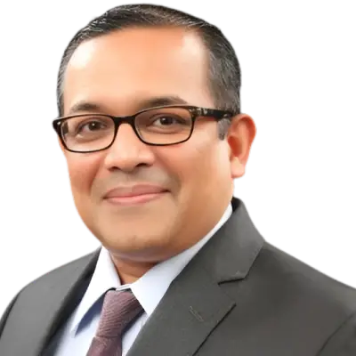 Dr. Ekroop Caur